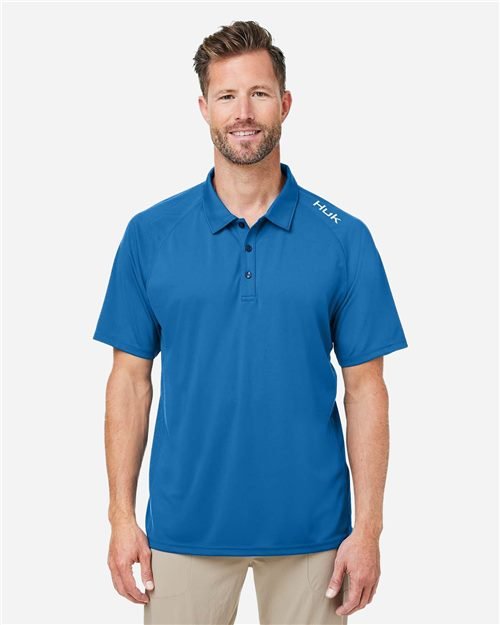 Custom embroidered HUK apparel decorated by East Coast Embroidery