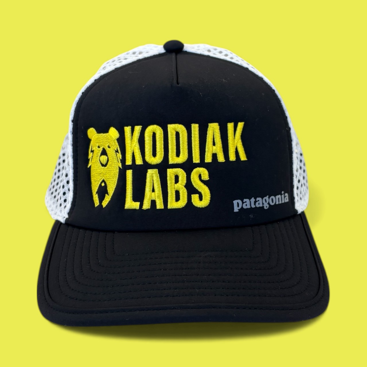 Patagonia trucker hat custom embroidered with the Kodiak Labs logo