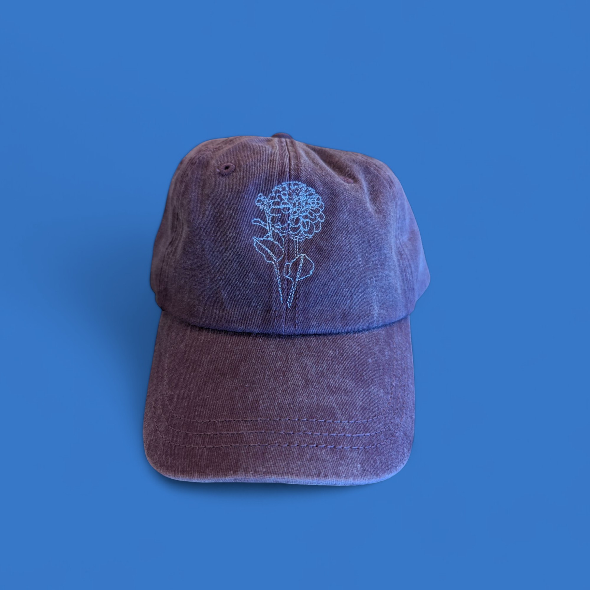 Dad hat custom embroidered with a minimalist flower design
