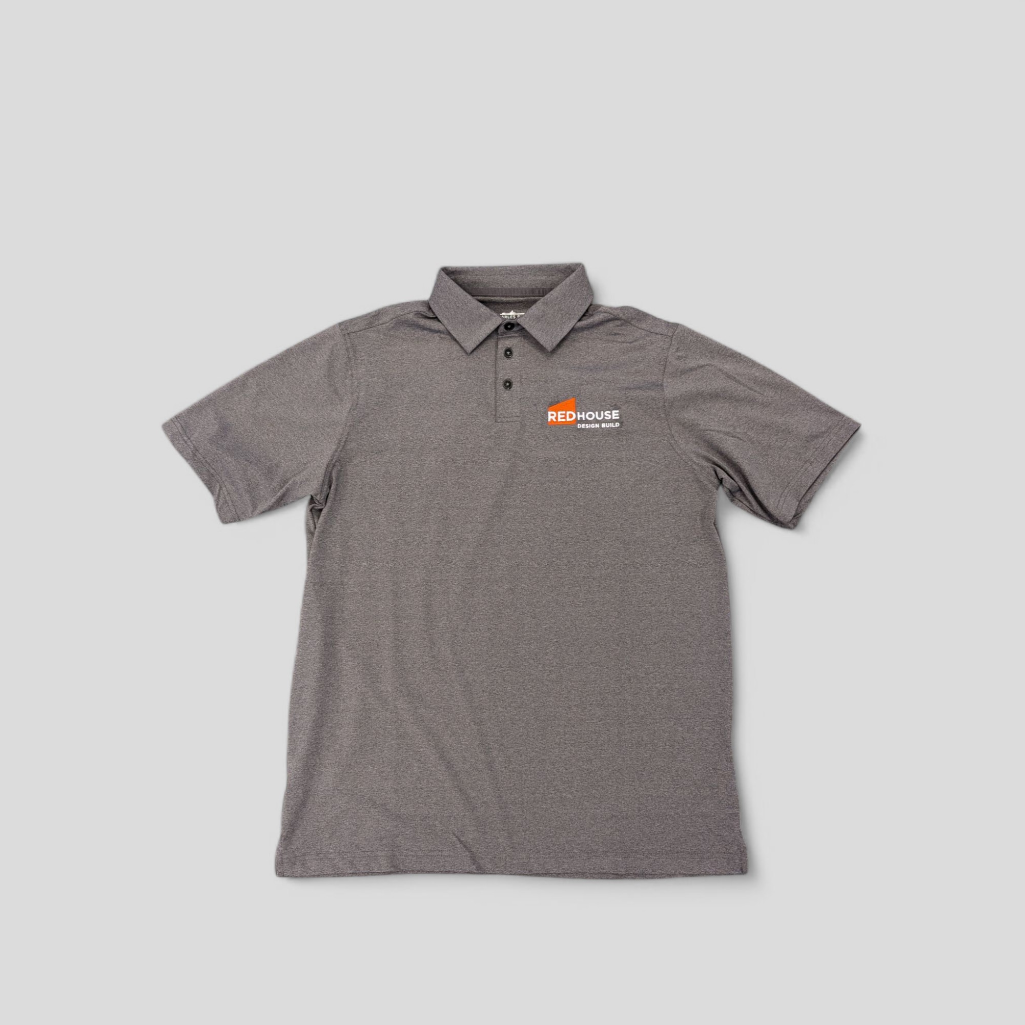 Heather grey performance polo embroidered with the Redhouse Design Build logo