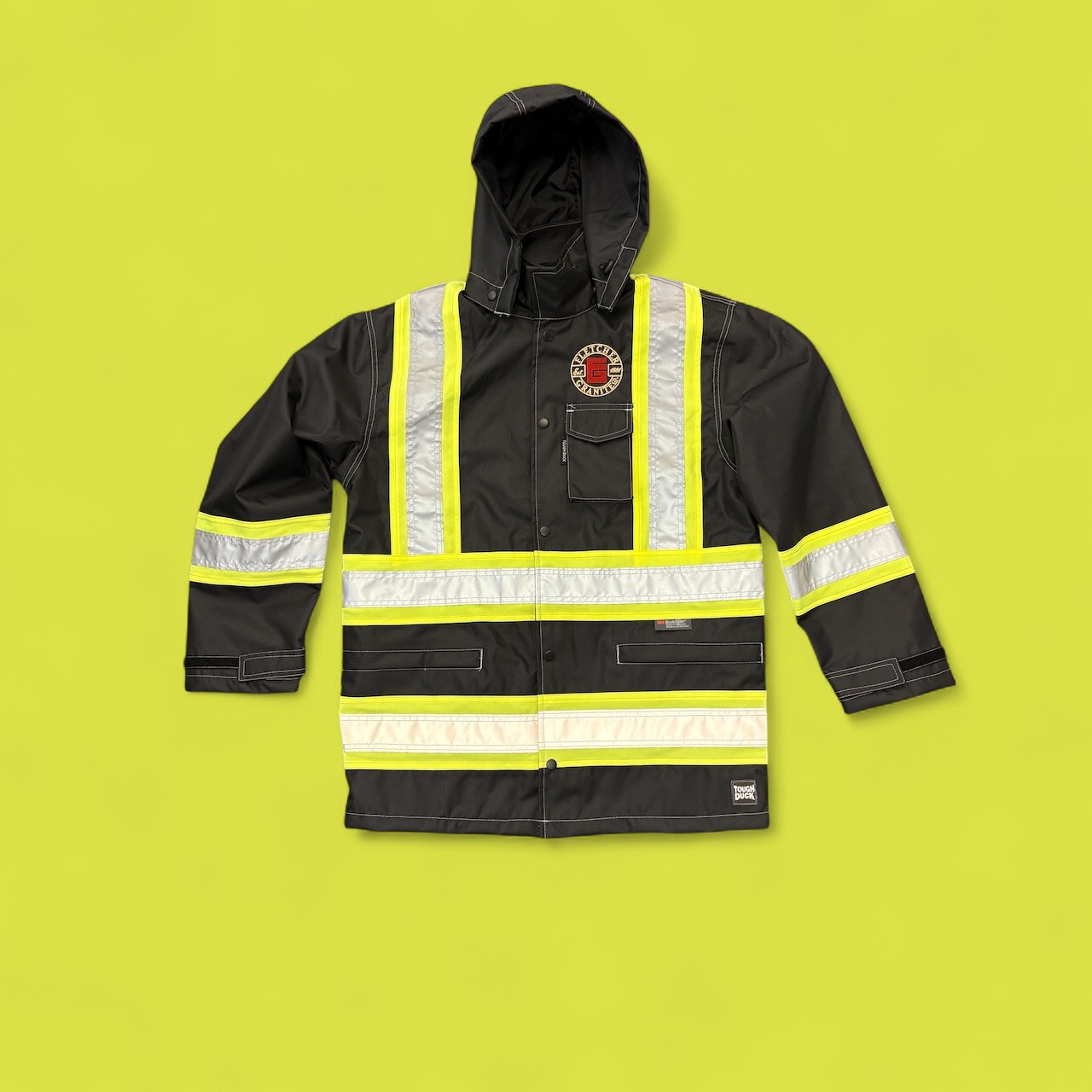 Fletcher Granite logo embroidered on a reflective hi-vis safety jacket for a Rhode Island construction company
