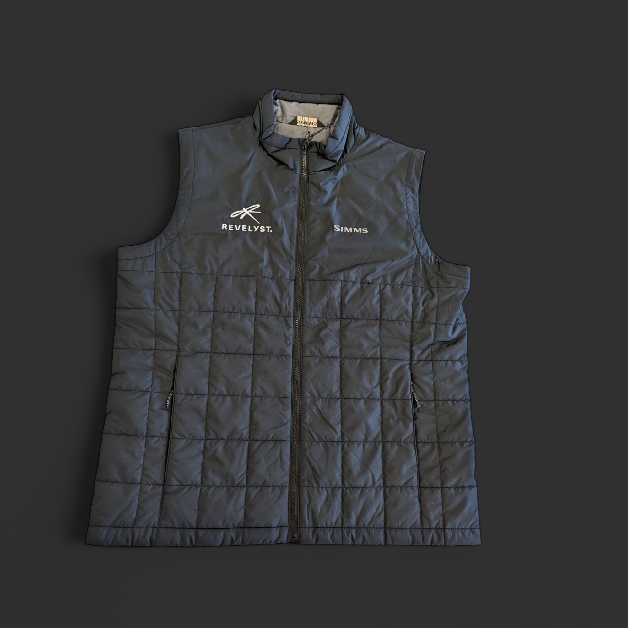 Quilted puffer vest custom embroidered for the Simms / Revelyst outdoor brand